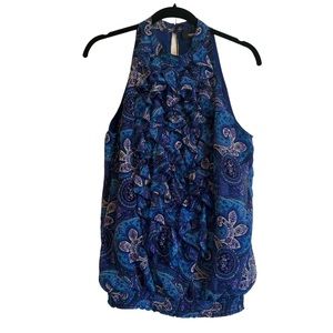 A beautiful flirty shirt , slightly used but great shape!